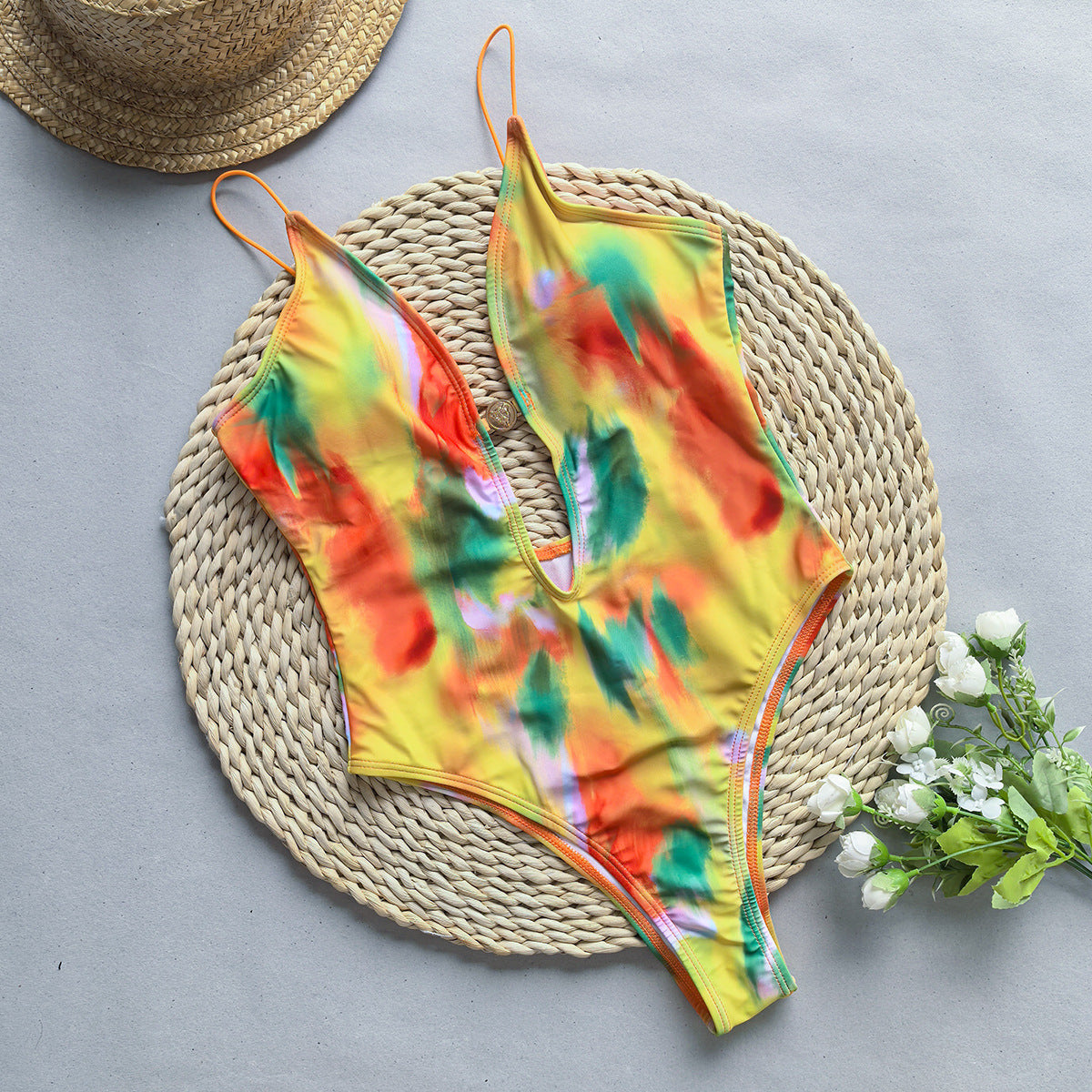 Yellow tie-dye one-piece swimsuit for women, perfect for fashion-forward ملابس choices