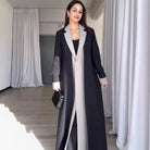 Black and gray long trench coat with white collar stitching contrast color
