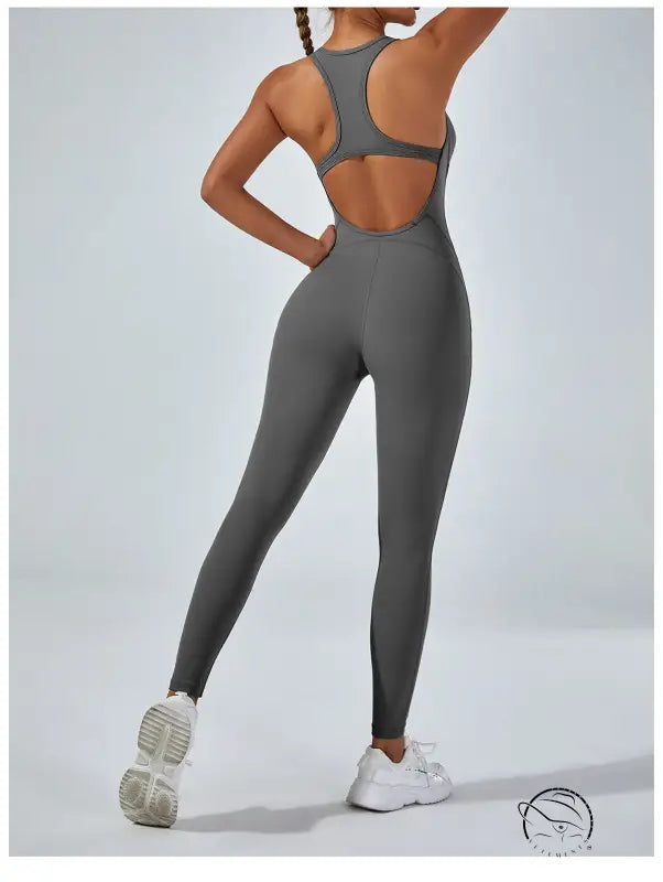 Gray langry yoga one-piece jumpsuit with cut-out back and seamless fashion design