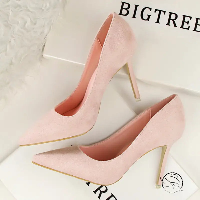 Pink simple stiletto high-heeled pumps with gold accents and pointed toes