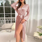 Soft pink satin langry robe with V-neck, long sleeves, self-tie belt