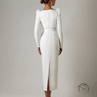 Elegant white long-sleeved langry fashion dress with belt and back slit