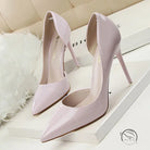 Pale pink patent leather low cut high heels with pointed toes
