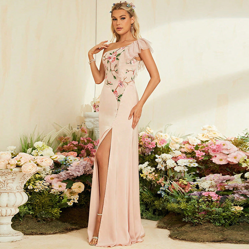 Blush pink evening gown with floral embroidery, perfect for a stylish cocktail party