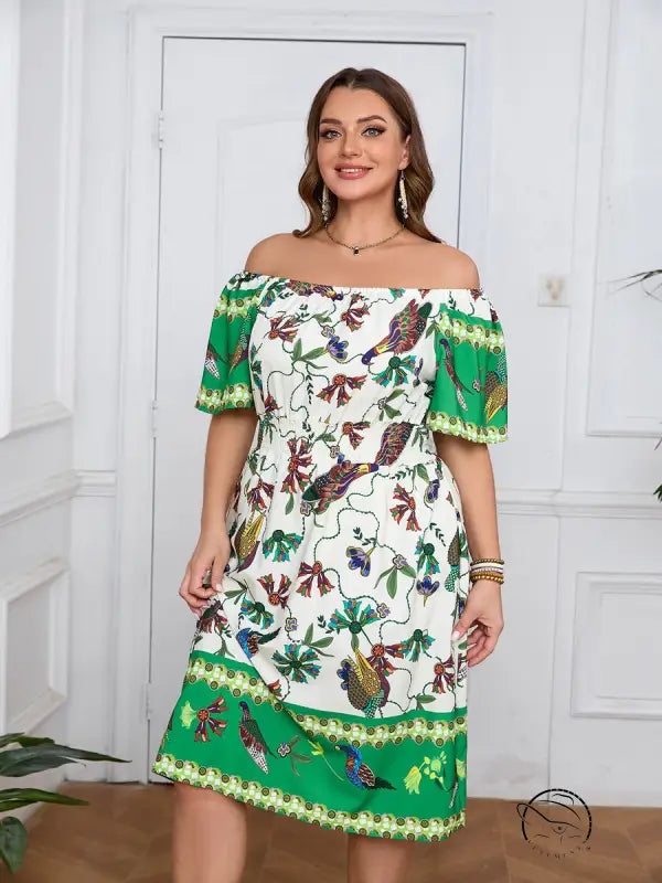 Elegant bohemian dress: woman in white off-shoulder midi with green border and bird floral patterns