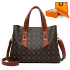 Langry high grade soft leather handbag in brown tan pattern with silver hardware