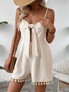 White tie-front tassel romper in Cute Knotted Jumpsuit, ideal for fashion enthusiasts