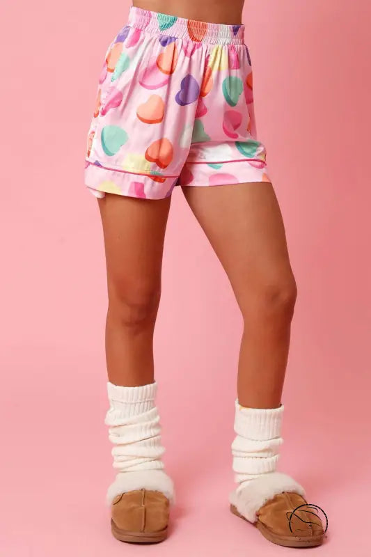 Cute two piece set pajamas with pink patterned shorts and white leg warmers