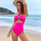 Hot pink cutout one-piece swimsuit with halter neckline for trendy summer fashion ملابس