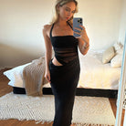 Black halter-neck cutout dress from Stunning Halter Split Maxi Dress collection, stylish fashion