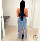 Stunning hip stretch denim long skirt with long straight black hair and back slit