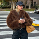 Gorgeous faux fur fox jacket with oversized brown coat, black buttons, belt