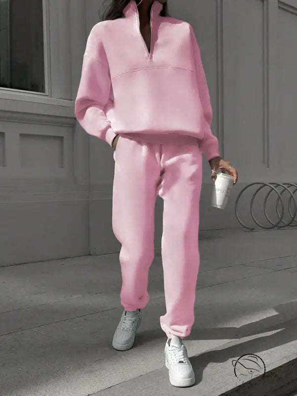 Pink Nike zip-up sweatshirt and pants set with white sneakers, langry fashion ملابس