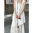 White layered sleeveless dress with black tassel cord details in Elegant Korean Style