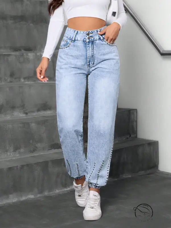 Light wash high-waisted beaded straight jeans with elastic cuffs
