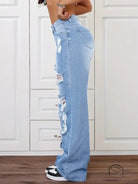 Light blue distressed langry fashion jeans with black white sneakers