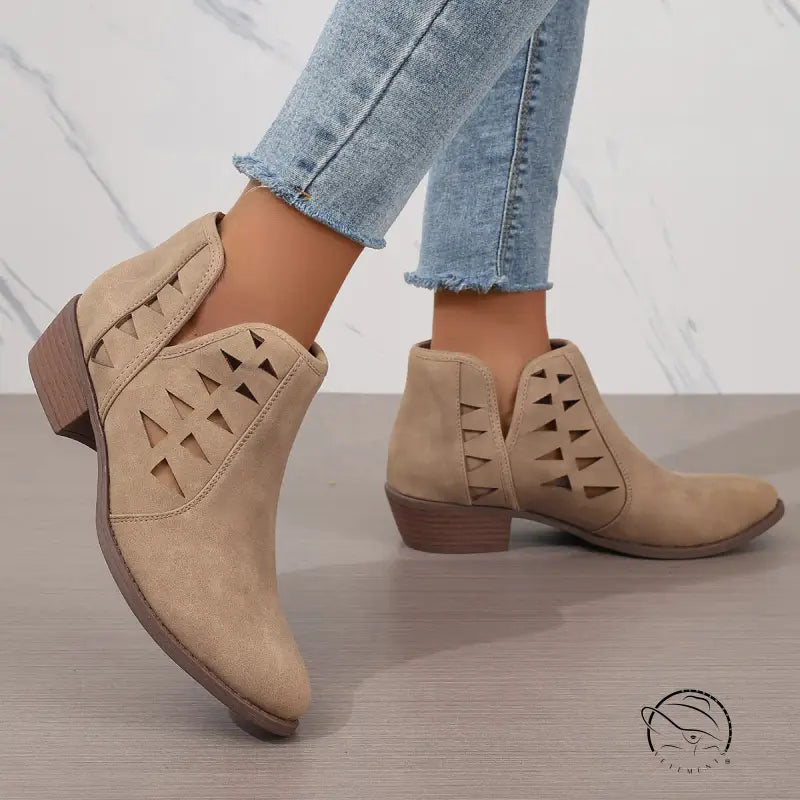 Beige suede daily ankle boots with geometric cutouts and low wooden heels