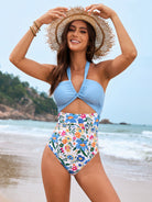 Light blue halter bikini top with floral swim bottoms and straw hat, perfect for langry fashion