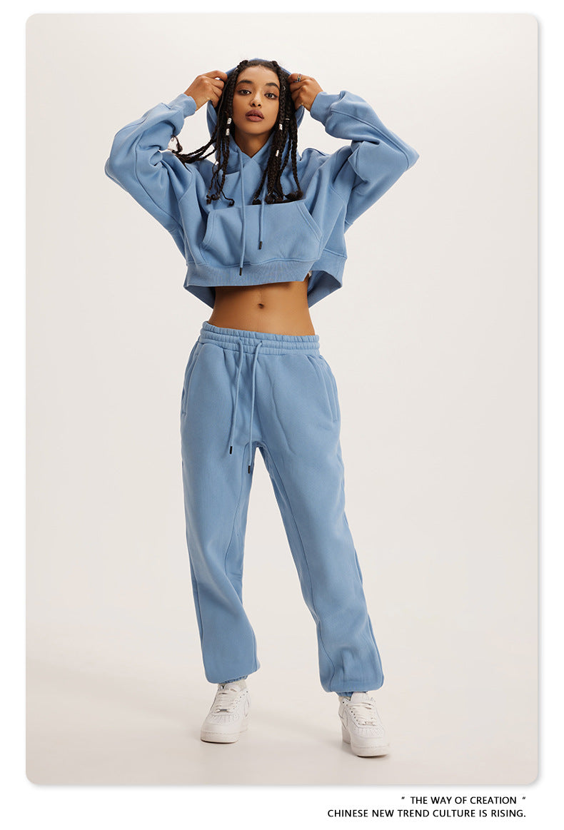 Light blue cropped hoodie and sweatpants loungewear set for stylish winter fashion ملابس