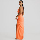 Orange one-shoulder maxi dress showcasing stunning cutout lace pleats in fashion ملابس