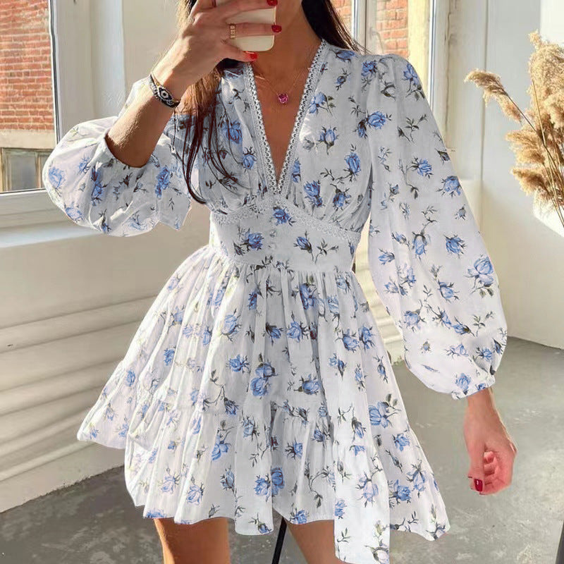 Floral print mini dress with long sleeves, perfect for elegant fashion in ملابس