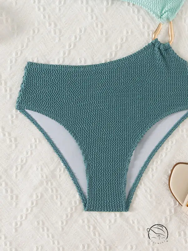 Stunning hollow out seafoam green textured bikini bottom with high-cut sides
