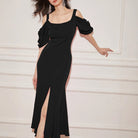 Elegant black off-the-shoulder dress with thigh-high slit for stylish fashion looks