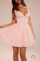 Stunning v neck sling dress in pink and white gingham with sweetheart neckline