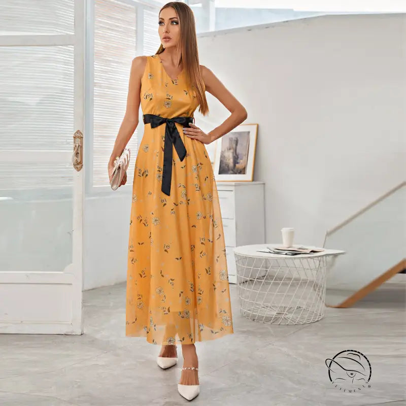 Elegant langry fashion maxi dress in yellow floral with black sash