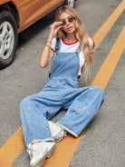 Casual Denim Jumpsuit paired with sneakers for trendy langry fashion ملابس