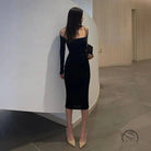 Black off-the-shoulder langry fashion midi dress in slim fit sheath style