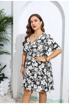 Black and white floral print Casual V Neck Loose Dress showcasing trendy langry fashion