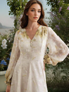 Enchanting Langry maxi dress in cream floral embroidery with bell sleeves and pearls
