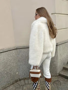 Gorgeous faux fur fox jacket with high collar and plaid boots