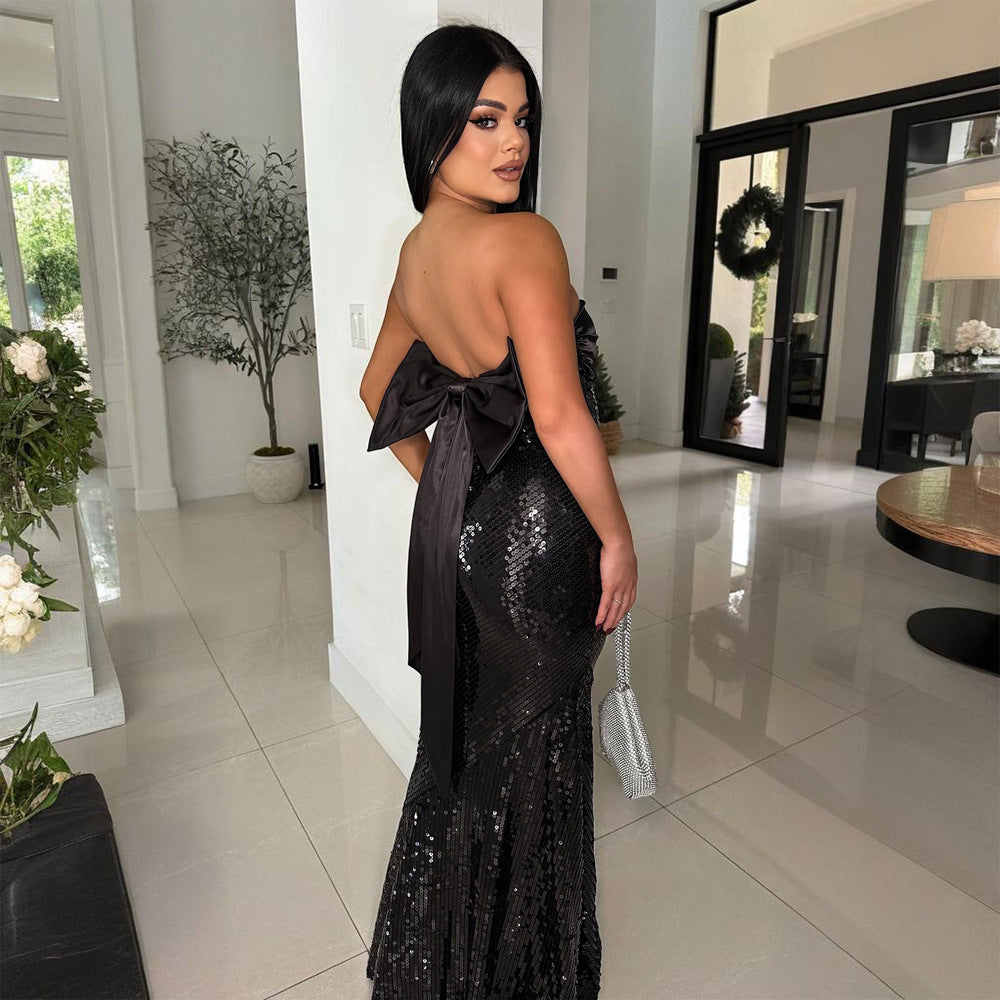 Sequin black strapless gown with bow, perfect for langry fashion and ملابس occasions