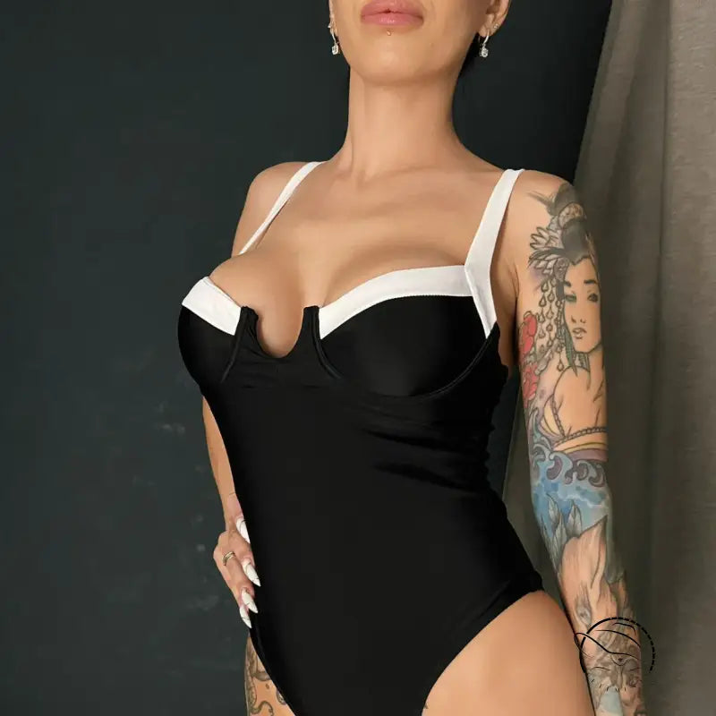 Elegant black and white langry one piece swimsuit in fashion ملابس