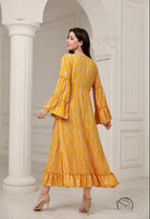 Elegant casual bell sleeve dress in flowing yellow paisley fashion