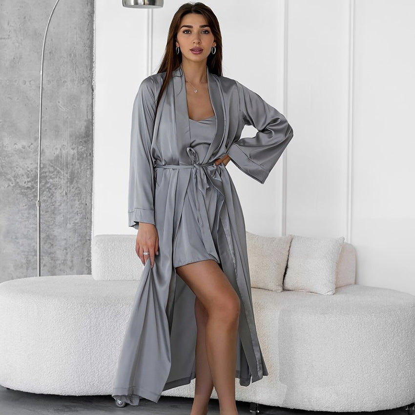 Elegant woman modeling comfortable high end home wear satin robe with matching slip