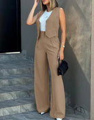 Elegant tan sleeveless vest jacket with wide leg pants set