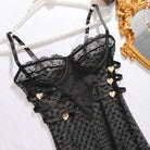 Black polka dot lace lingerie set with heart embellishments and sheer fabric