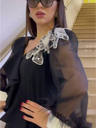 Stylish black long sleeve dress with sheer sleeves from Autumn V Neck Pansy Dress collection