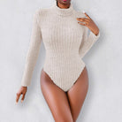 Beige ribbed knit long sleeve turtleneck bodysuit in slim fit fashion