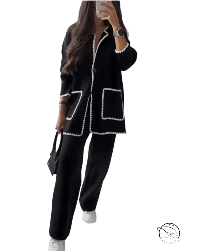 Black coat with white trim and pearl detailing in women stitching bag set