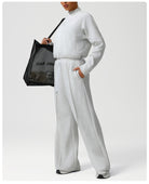 Light gray langry fashion jumpsuit with drawstring waist and long sleeves
