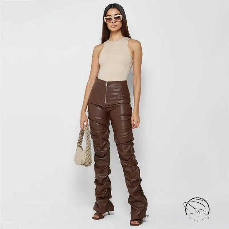 Woman in tight faux leather pants for Four Seasons product