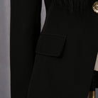 Elegant Langry fashion black high-waisted pants with gold buttons and fringe