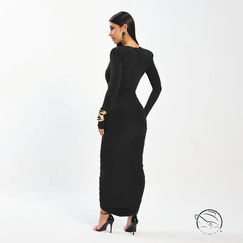 Elegant slim evening black ruched maxi dress with long sleeves and gold accents in langry fashion