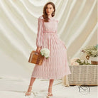 Pastel pink long sleeve French Sweet Lace Collar dress with ruffled pleated skirt and wooden handle bag