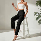 Black high-waisted straight-leg dress pants for women, ideal for fashion-forward work attire