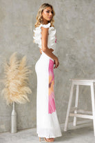 Woman in two-piece floral outfit showcasing langry fashion from Gorgeous Mesh Slim Fit Dress